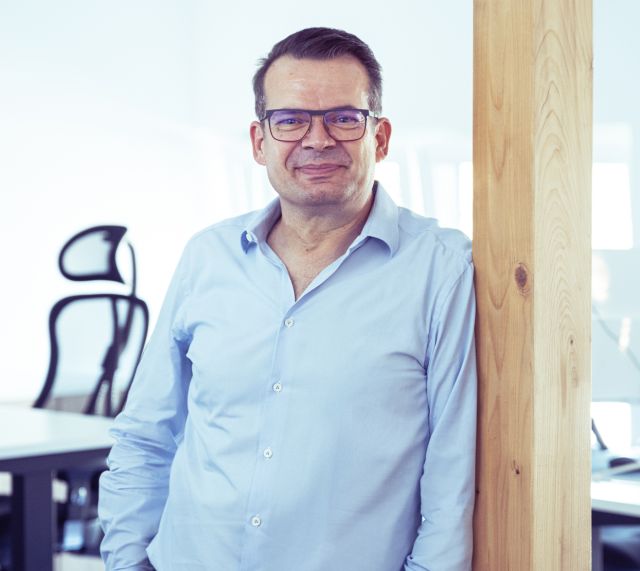 Herr Heymanns in seinem Büro